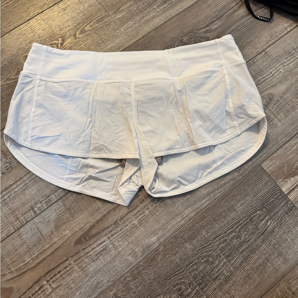 Lululemon Athletica White Athletic Shorts with Curved Hem